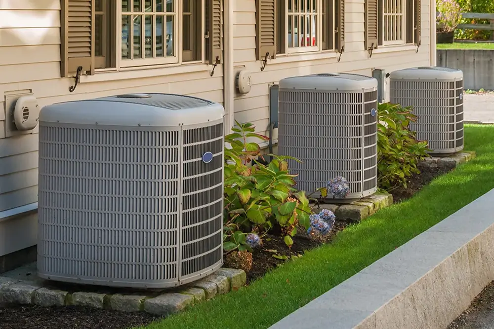 Residential HVAC services technician servicing a home air conditioning system in Orlando, FL